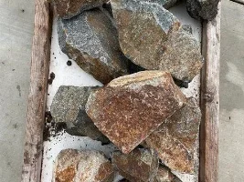 Is this rust on my rocks? My grandpa got these rocks for me from his backyard but I think theres rust on them. Can I use them in my tank?