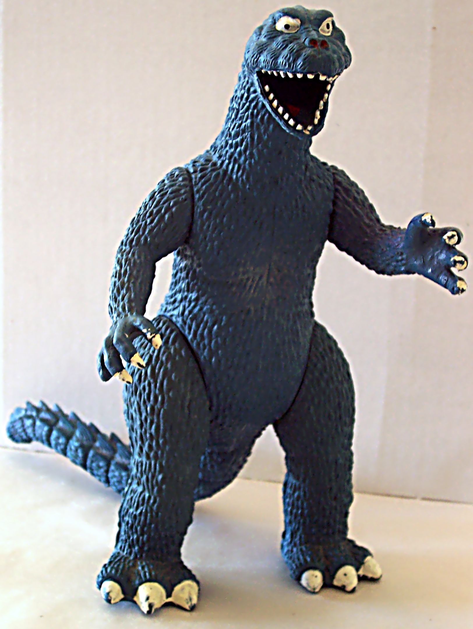 blue-godzilla-toy-godzilla-1439544-1624-2160.jpg