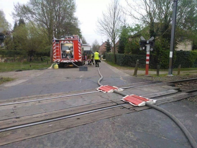 Firehose-and-Train-Tracks-685x513.jpg